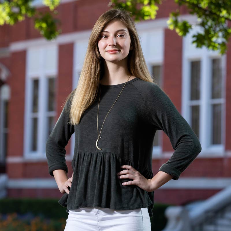 Libby Casey in a white shirt on Samford Lawn.