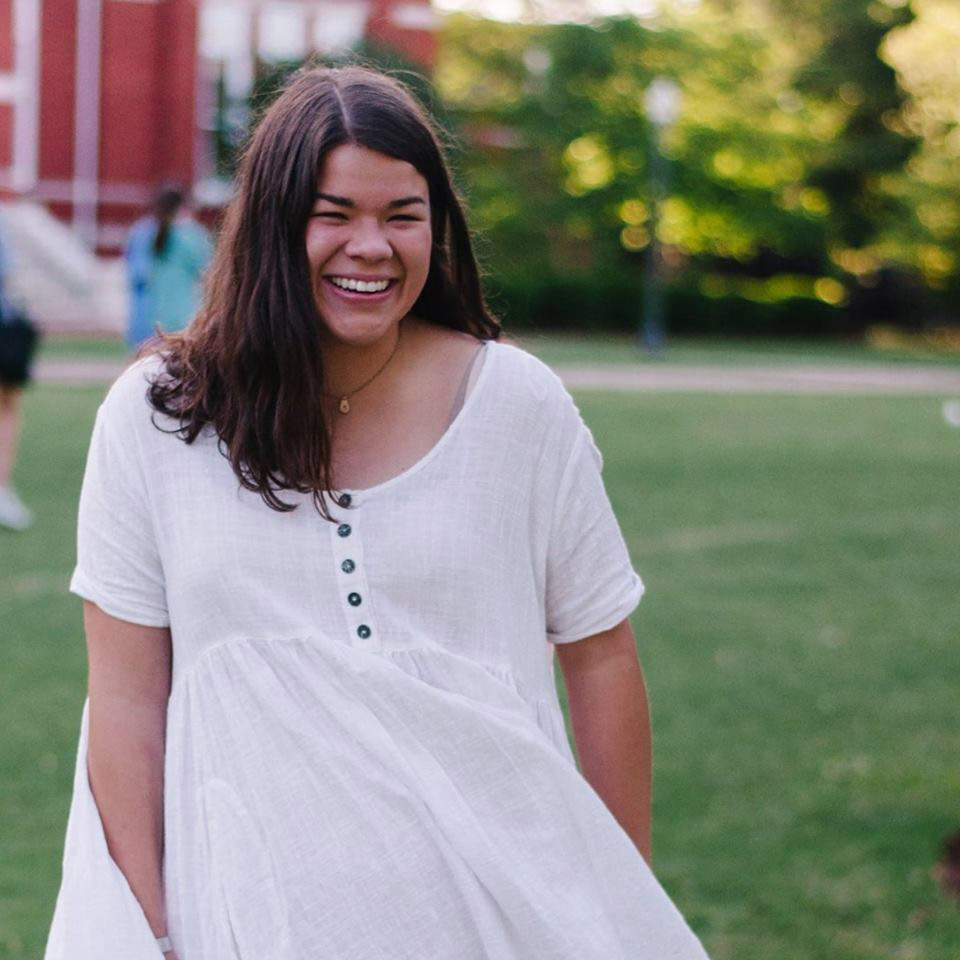 Libby Casey in a white shirt on Samford Lawn.