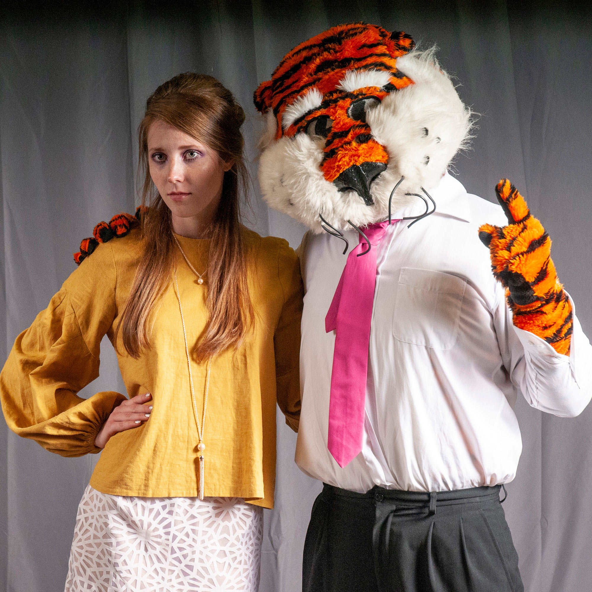 Model at the backstage photo screen with Aubie.