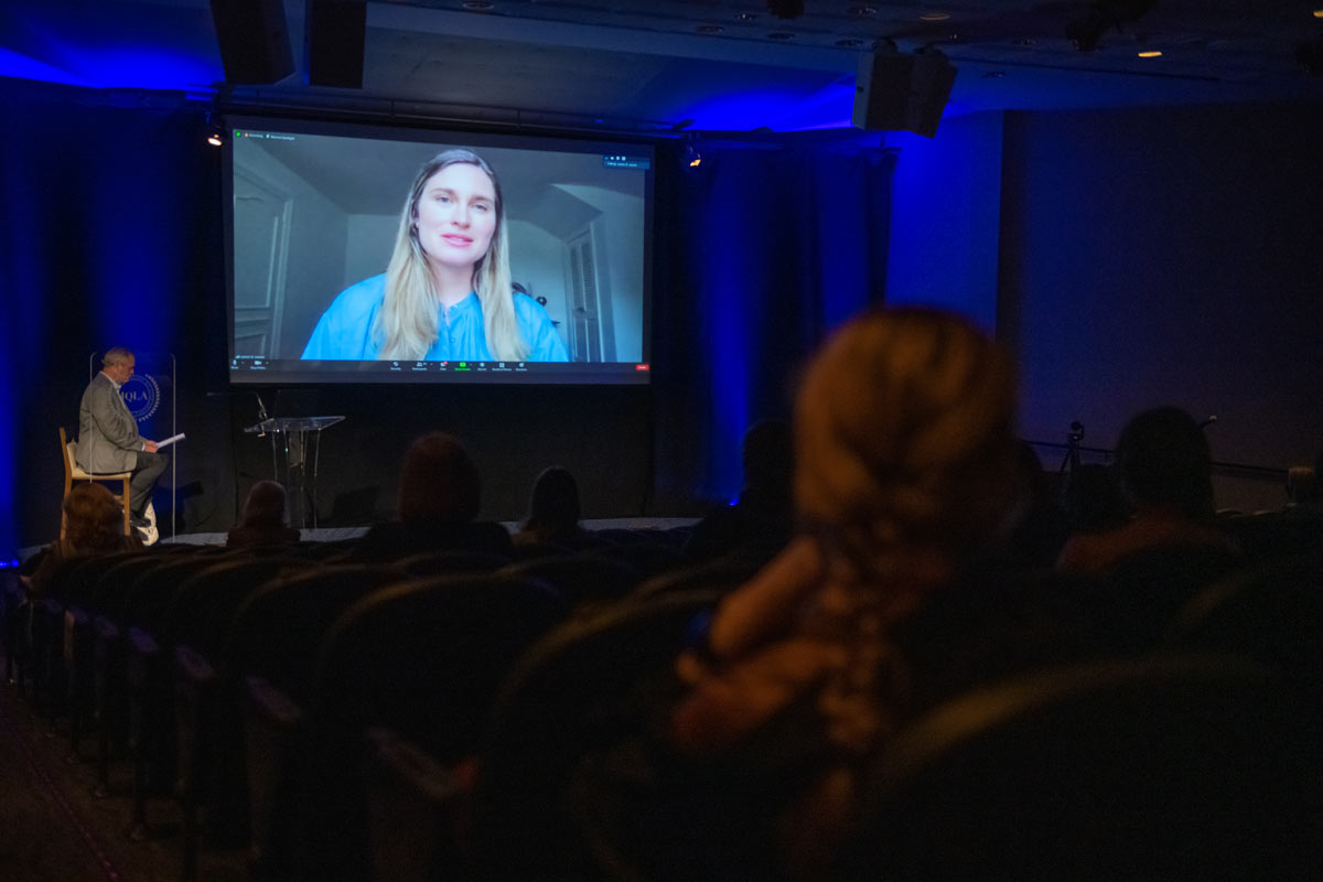 Photo of Lauren Bush Laurn on screen in the auditorium of The Hotel at Auburn University