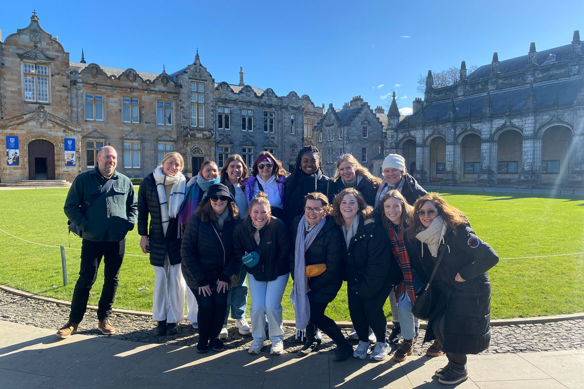 Students and faculty outside of University of St. Andrews