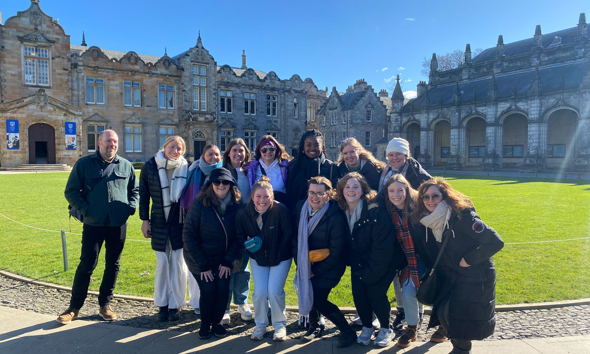 Students and faculty outside of University of St. Andrews