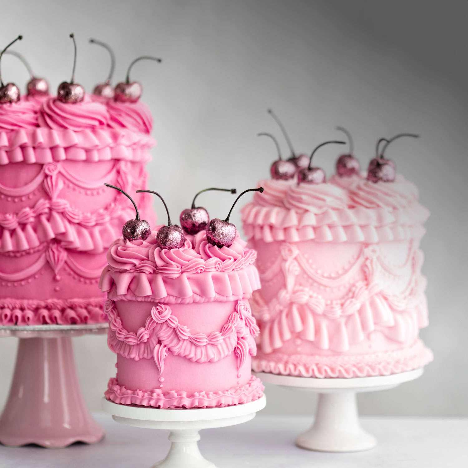 Photo of cakes decorated with pink icing