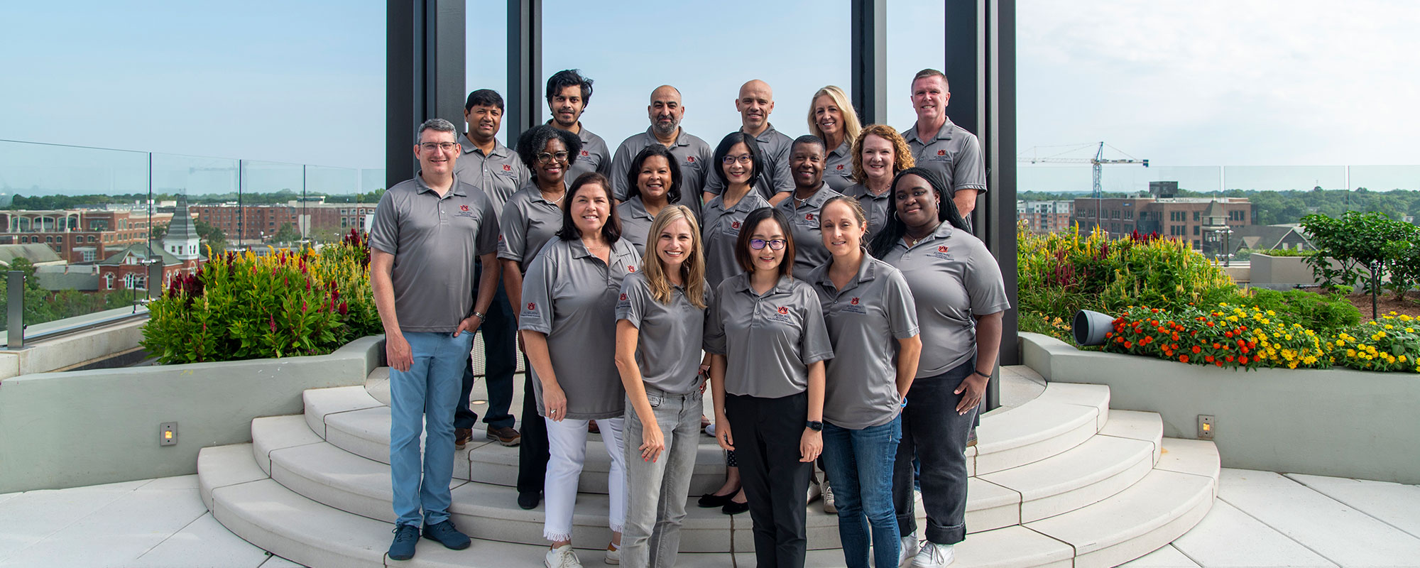 Hospitality faculty and staff on Rane rooftop