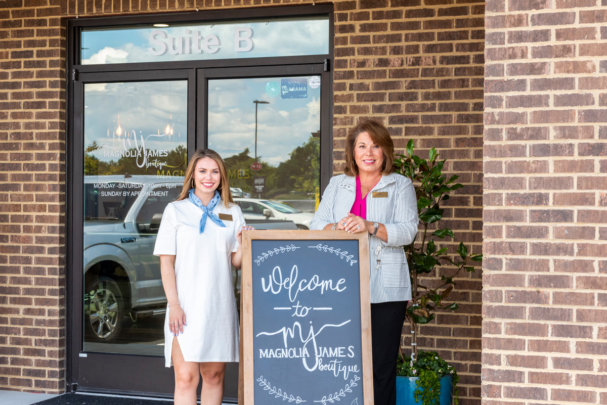  Brooke Kirkpatrick, with her mother Laura Lewis Kirkpatrick, standing in fron of Magnolia James Boutique.